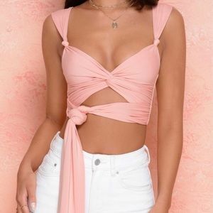 pink crop top with twist detail